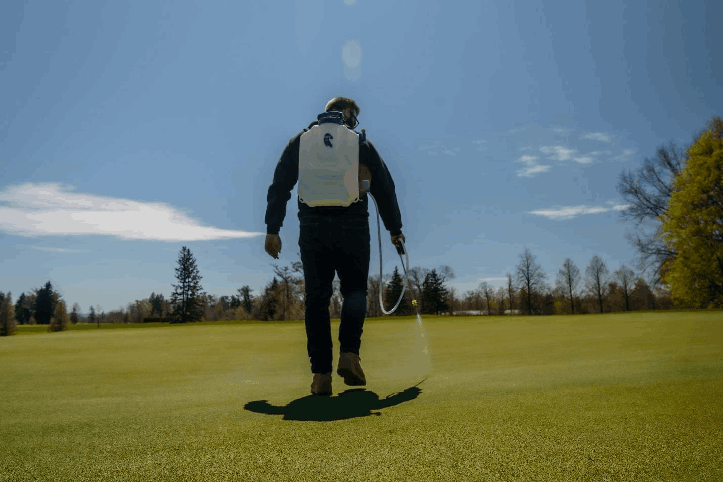 Why use a backpack sprayer for lawn care?